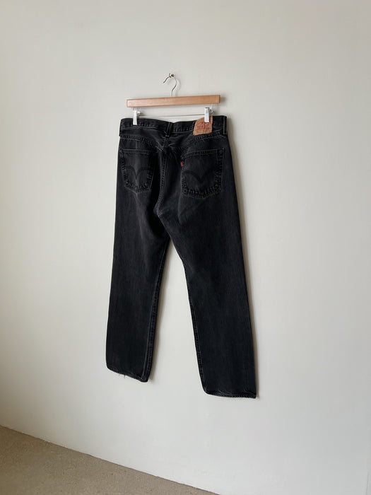 Worn Black Levi's 501 Denim | 34