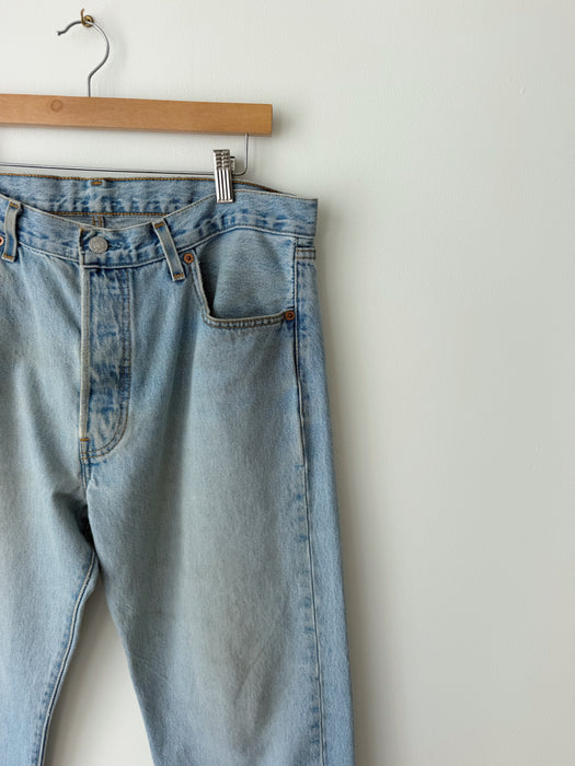 Distressed Mid Wash Levi's 501 Denim | 34