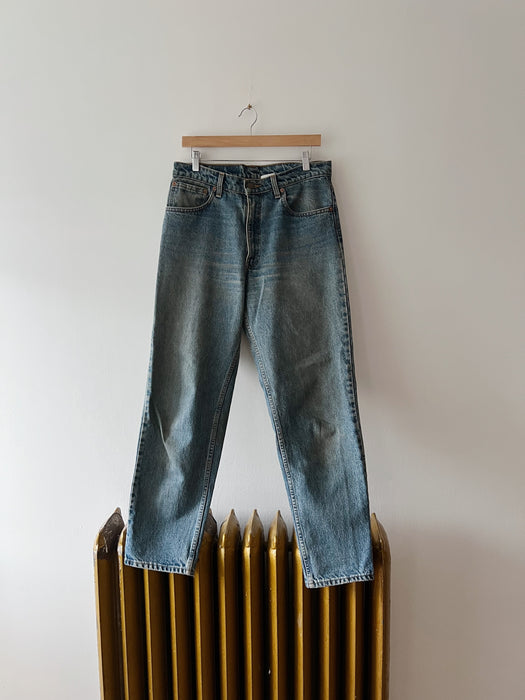 Distressed Mid Wash Levi's 550 Denim | 32